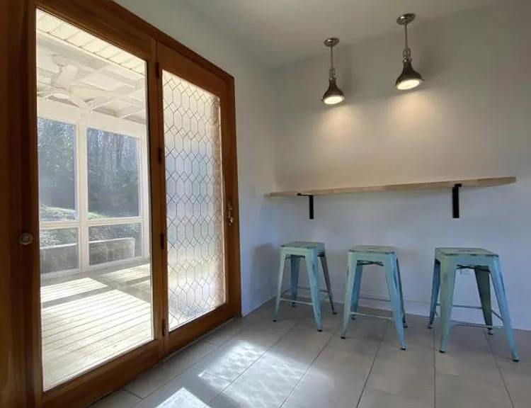 Breakfast bar or homework spot adds additional seating to the dining area