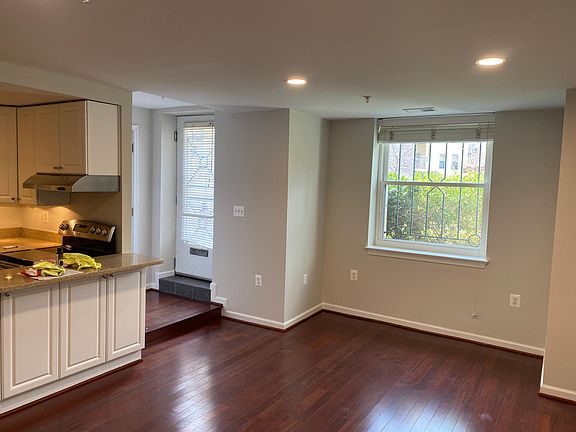 Entrance, living room and some of kitchen