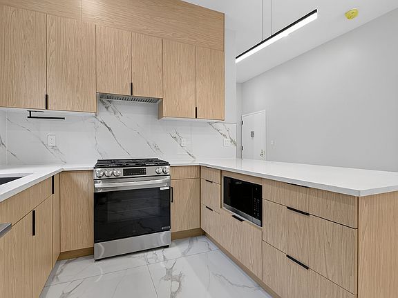 5th image of 38-21 52nd St #2