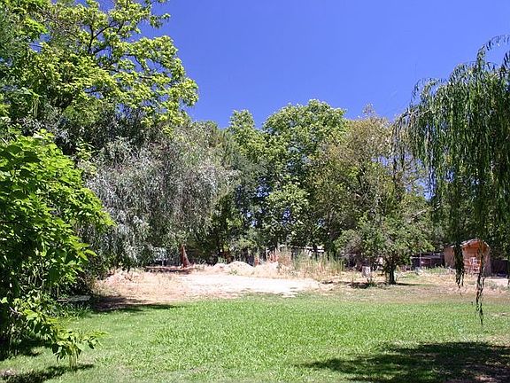 3/4 acre total! Great for horses, kids, dirt bikes...