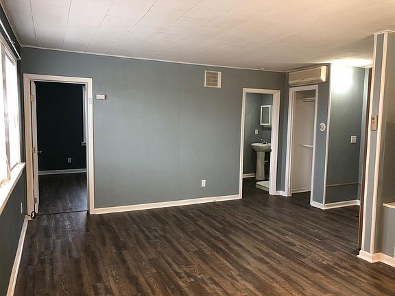 Great room - new vinyl plank flooring throughout