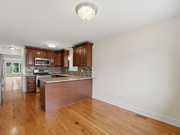 5th image of 4225 N Newland Ave