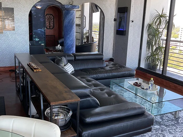 Open concept with tvs in both bedroom and living room