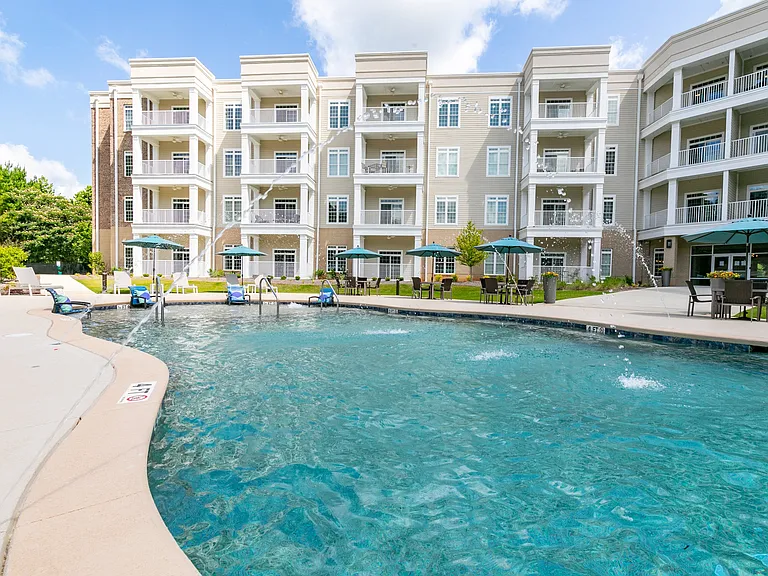 Shimmering swimming pool with water features