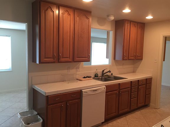 Kitchen with dishwasher and double sink