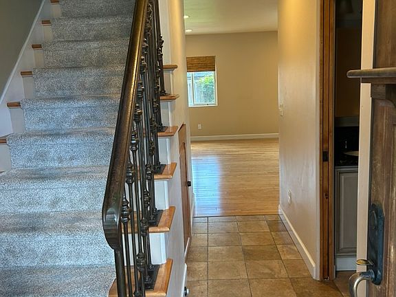 Front door entry, 1/2 bath on the right next to coat closet