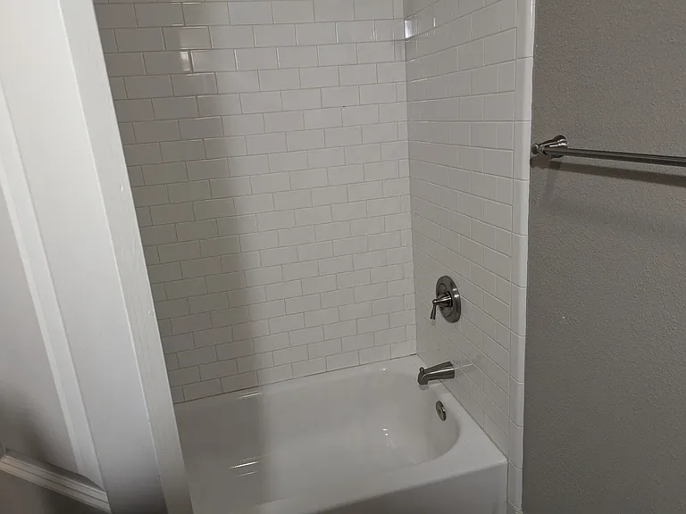 2nd bath with tub/shower combo. Directly across from 2nd bedroom.