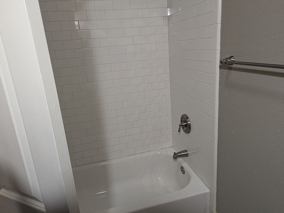 2nd bath with tub/shower combo. Directly across from 2nd bedroom.