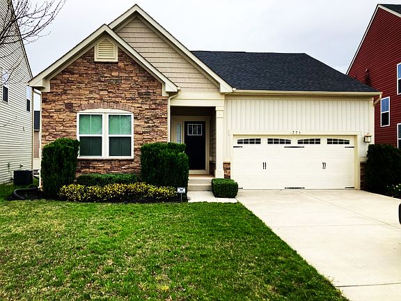 Beautiful Front of Home with beautiful landscape yard.