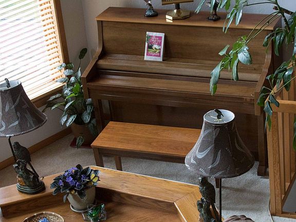 Piano in cove off living room