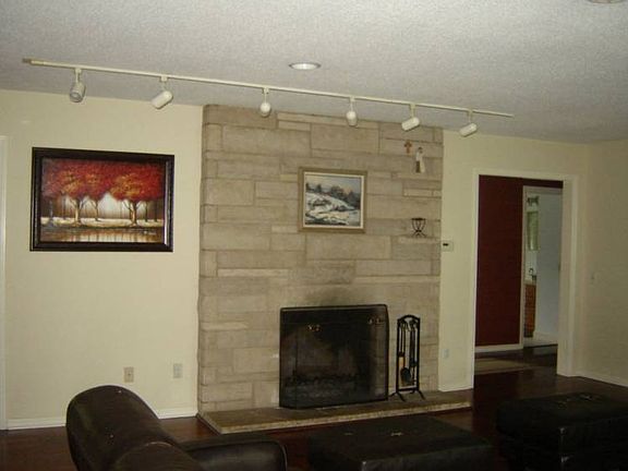 br /This is the fireplace in the Living Room.