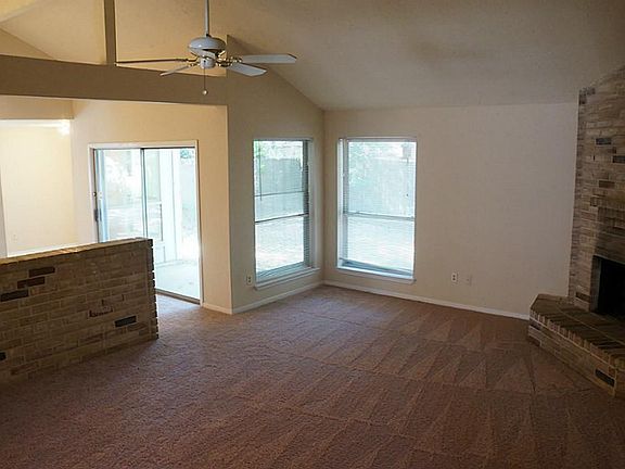High Ceilings With Fresh Carpet and Paint Throughout