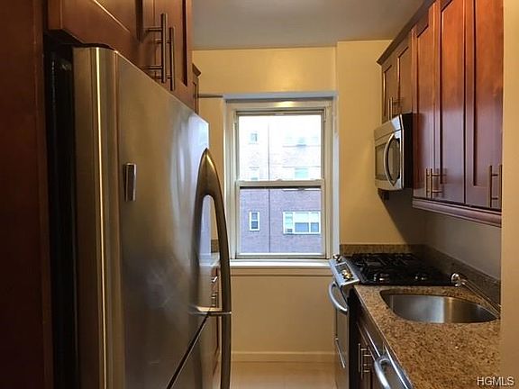 Renovated kitchen features cherrywood and stainless steel