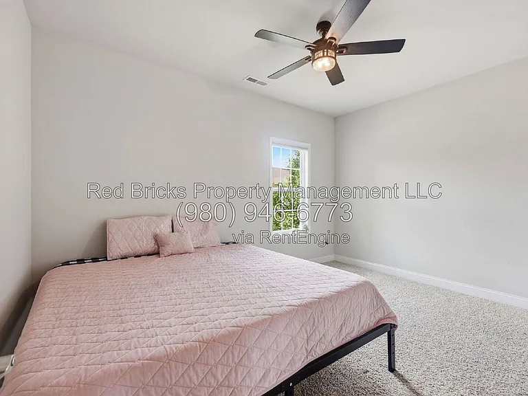 9659 Camberley Ave NW — Photo 33