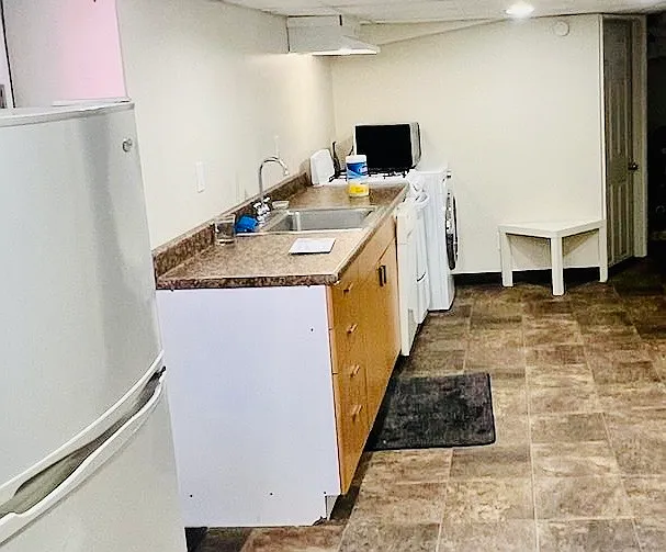 Kitchen Counter with stove and washer