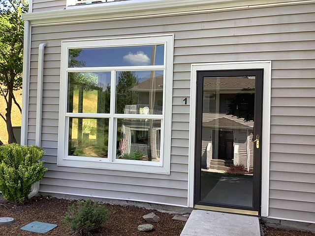 Enclosed front sun-porch.