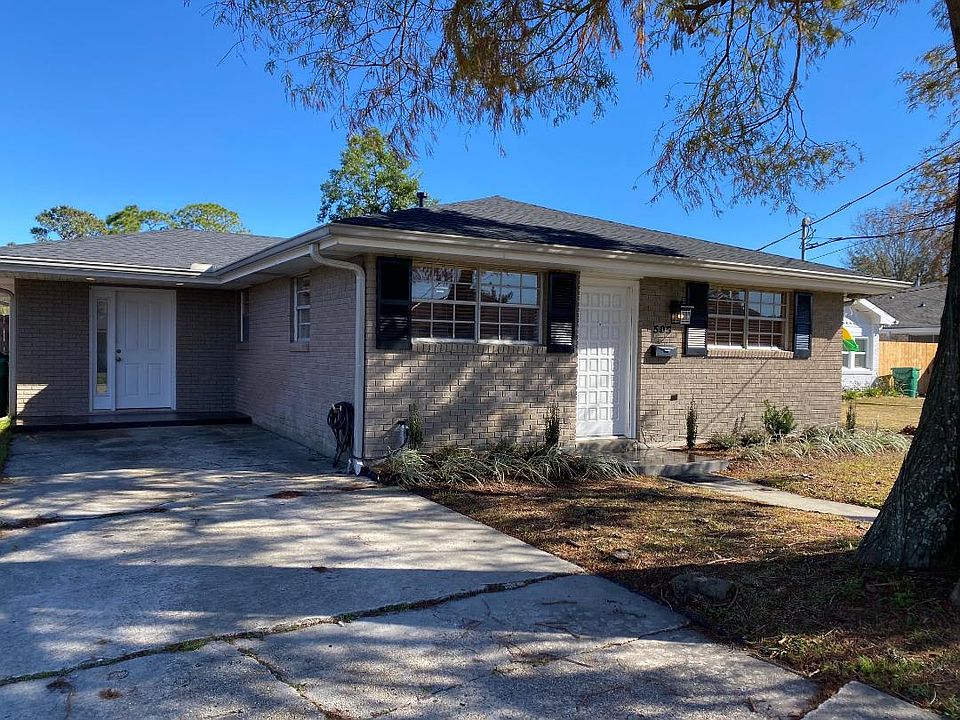 505 E. William David Pkwy. front with off street parking driveway and side entrance to Family Room.