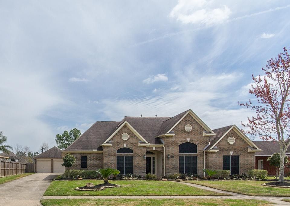 Gorgeous one story with detached garage, large back yard, beautifully landscaped with sprinkler syst