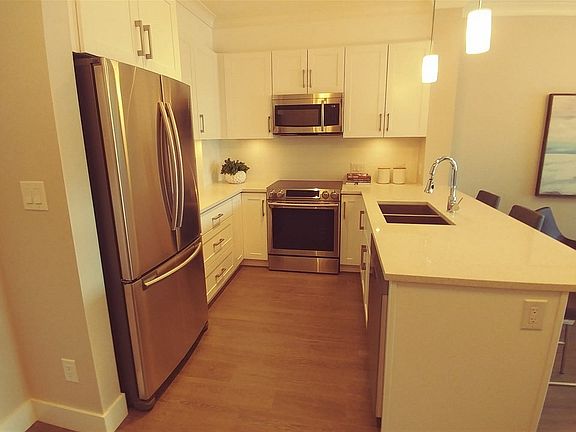 5th image of 5020 221a St #215