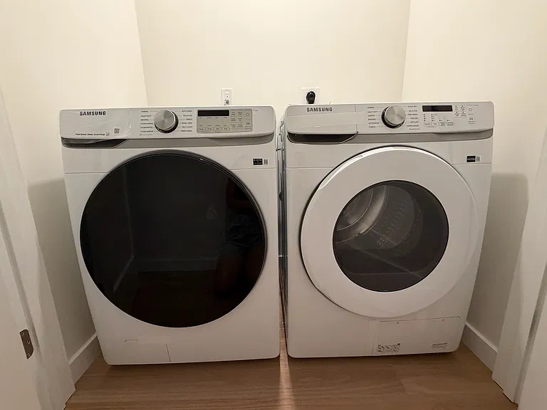 Brand new washer and dryer. Dryer is a condensing, heat pump dryer -- consistent with the net-zero ethic.