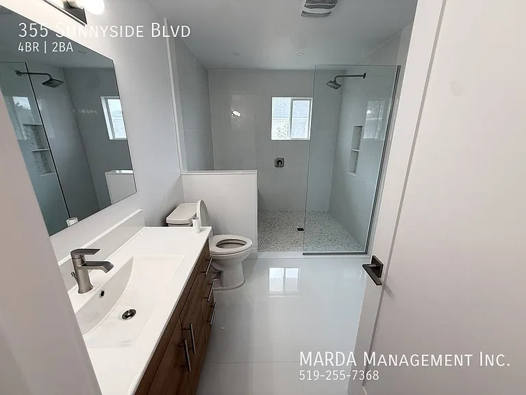 355 Sunnyside Blvd — Photo 62