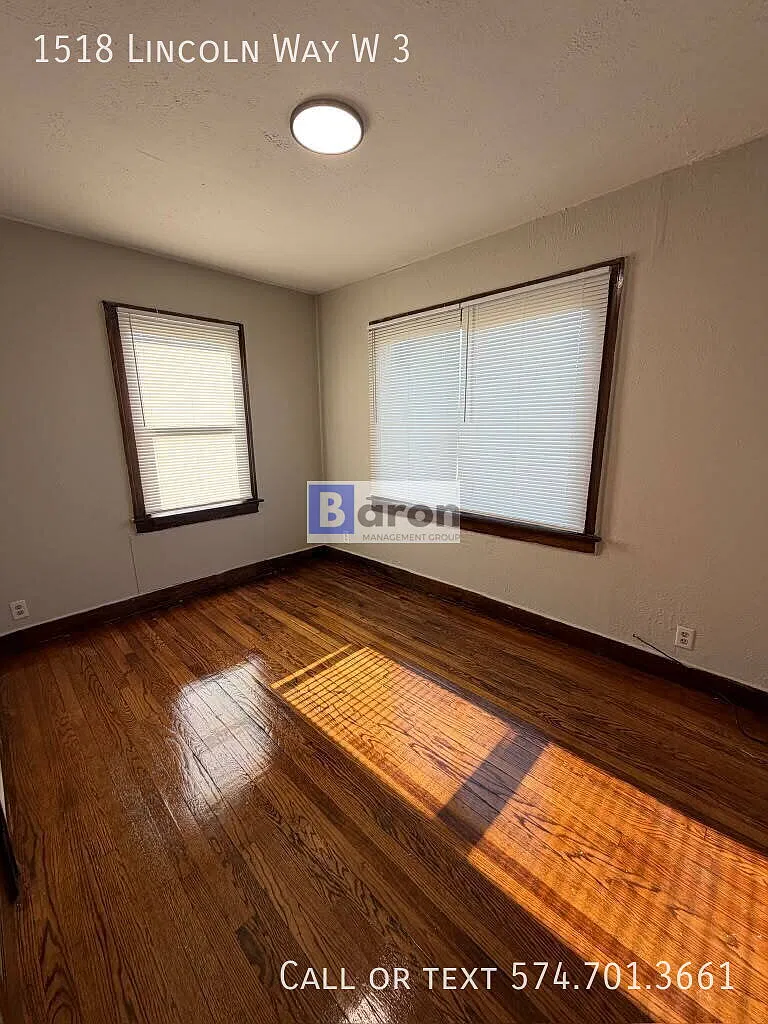 "Charming 1-Bed with Gleaming Hardwood Floors in South Bend!" — Photo 3
