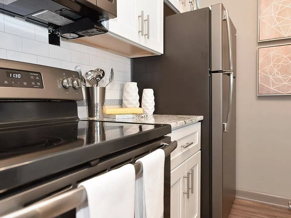 Kitchen with stainless appliances and granite counters