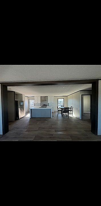 living room view to kitchen