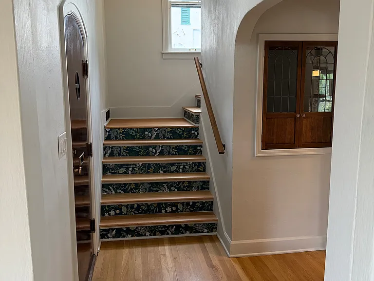 Entry area features powder room and coat closet