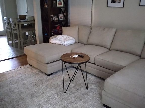 Living room with prior tenant's furniture