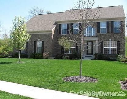 All brick exterior : upgraded landscaping, curved sidewalk to front door, full glass front door