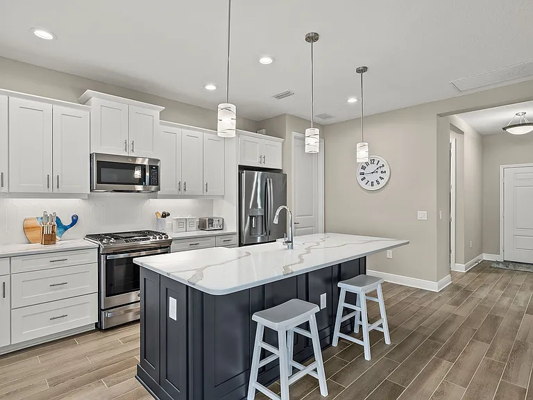 One year old stainless steel appliances, including gas stove with griddle.