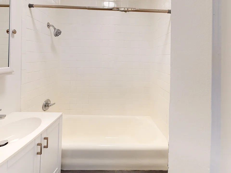 Bathroom with sink and bathtub