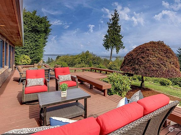 Enormous deck is built for entertaining family and friends.>