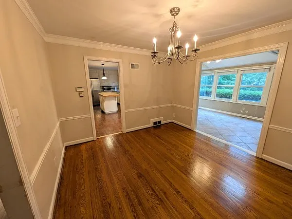 Dining Room connects to Living Room, Kitchen and Sunroom.