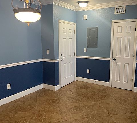 view of entrance to condo from dining area