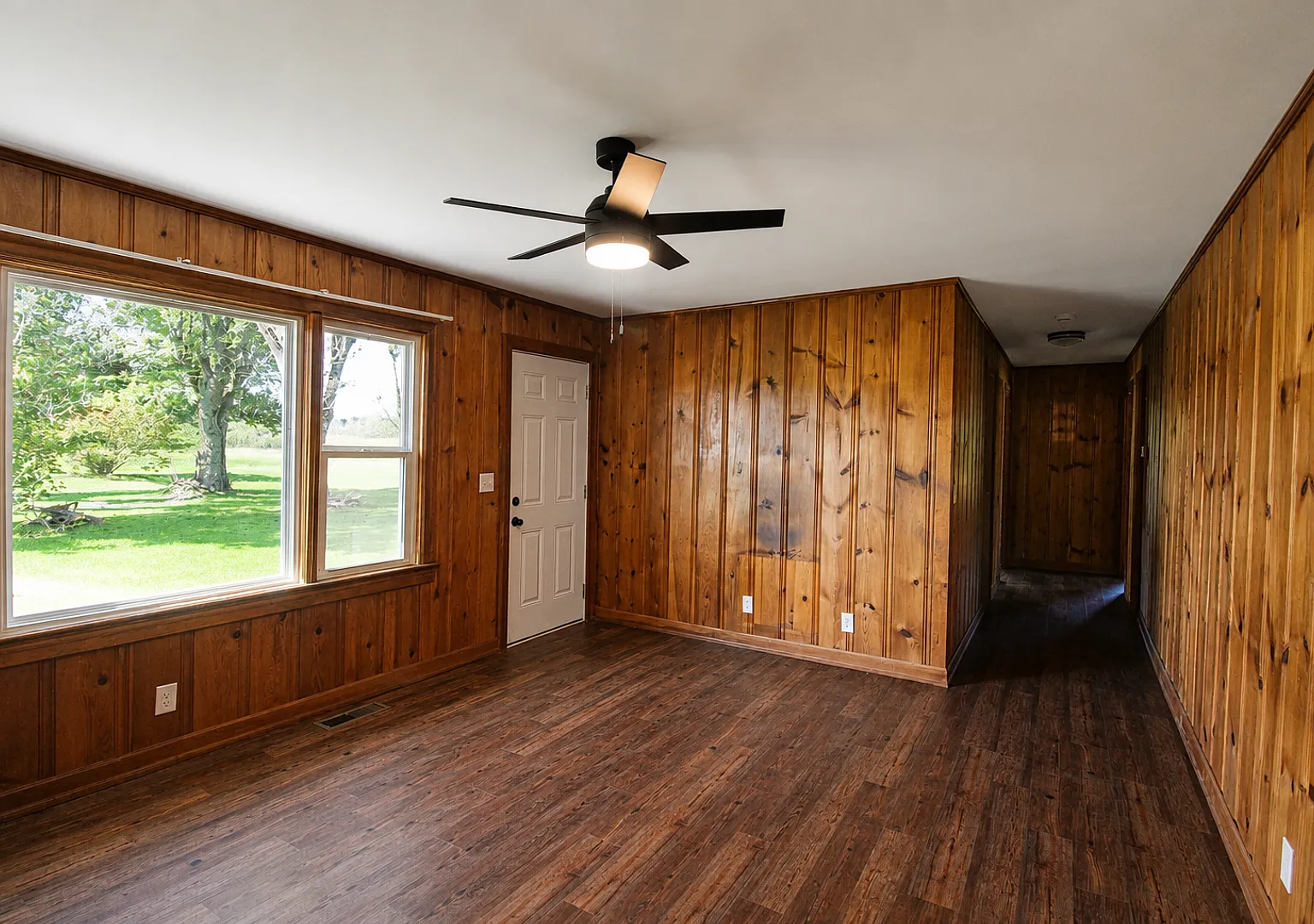 Updated 3-Bedroom Home with Covered Porch and Detached Garage in Baxter — Photo 4