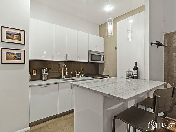 2nd image of 39 E 12th St APT 311