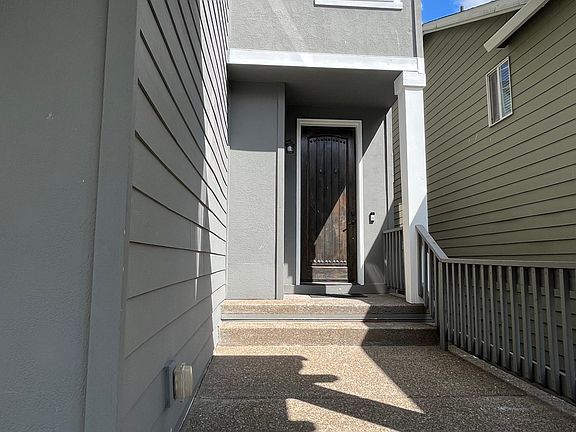 Entrance with partially enclosed patio