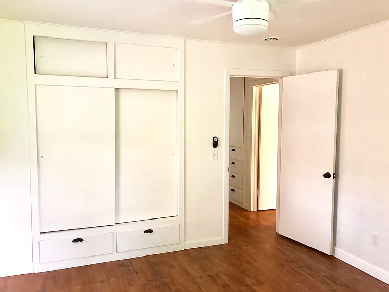 Bedroom #2 with window blinds. Fits a King or Queen bed. New modern ceiling fan with LED light with dimmer and variable speed fan.