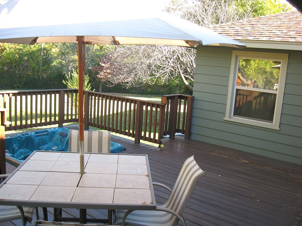 850 sq ft deck with 6 person hot tub with park like view