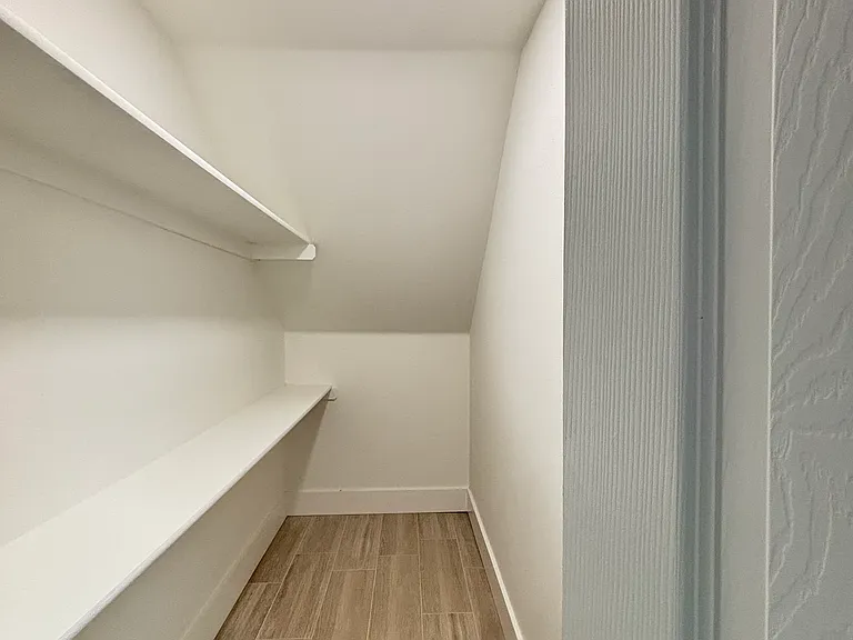 Under stairs storage (downstairs unit only)