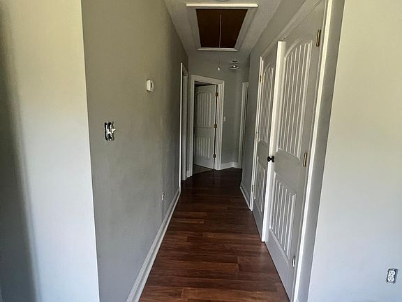 Hall leading to bedrooms and baths