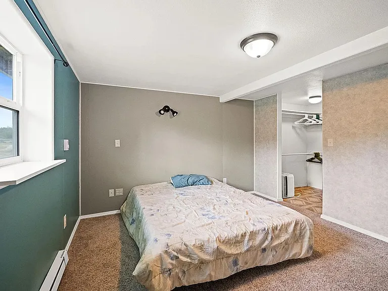 Bedroom 1 with walk-in closet