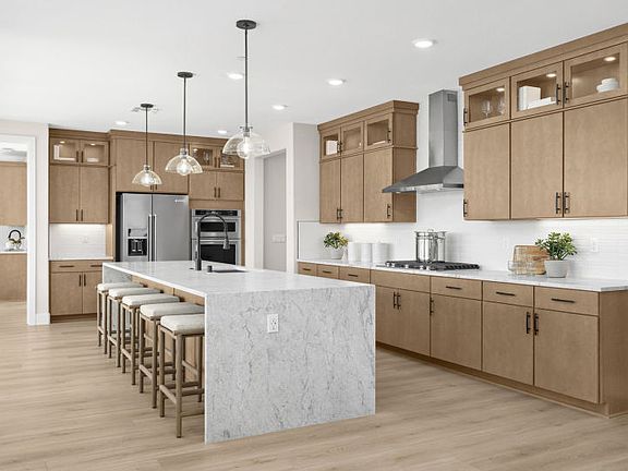 Spacious kitchen with ample storage and large central island