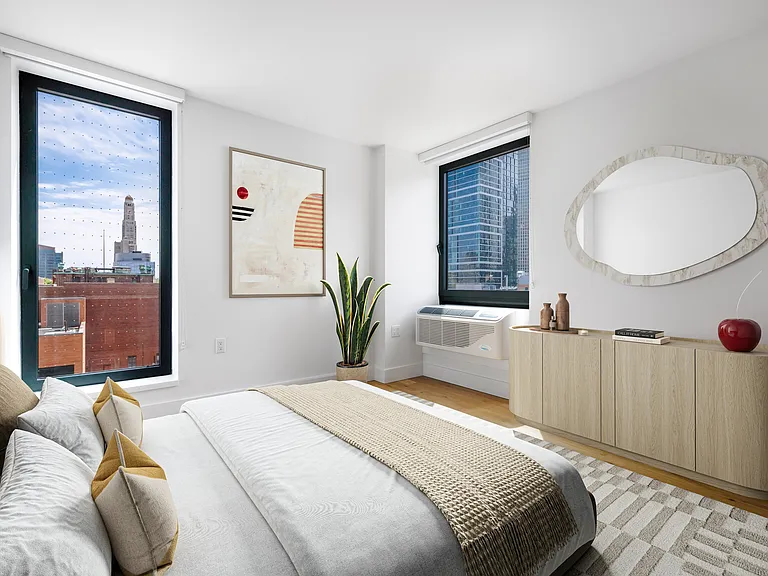 Welcome to a serene retreat at 240 Willoughby, where modern elegance meets comfort. This stylish bedroom features large windows, ample natural light, and chic decor. Elevate your living space todaya"schedule your tour now!