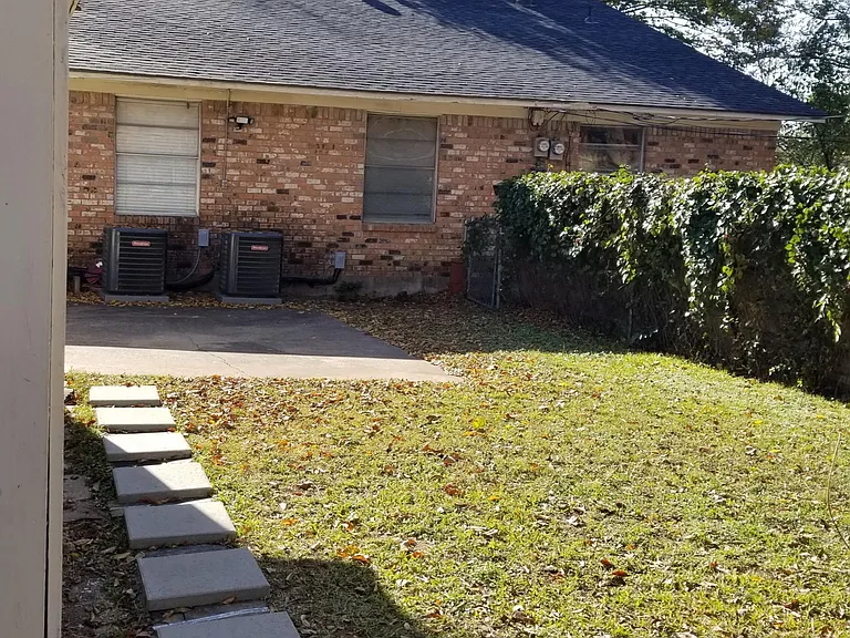 Private Wood Fenced in Backyard & Additional Parking/Patio.