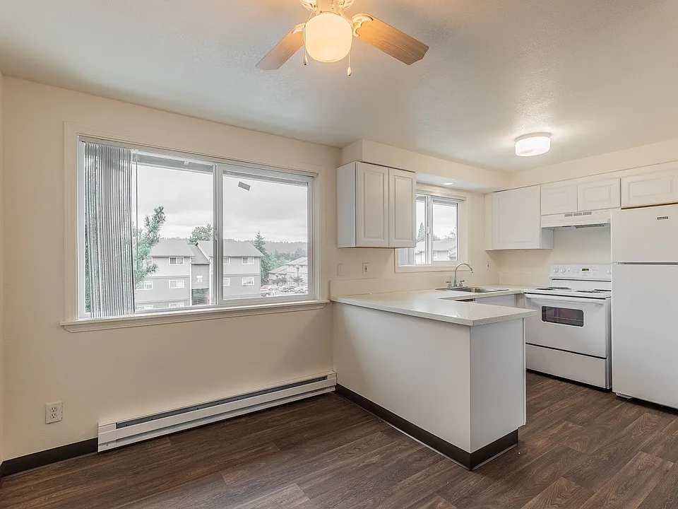Enjoy a bright, open dining area perfect for entertaining at Fox Pointe Apartments in Portland, OR.