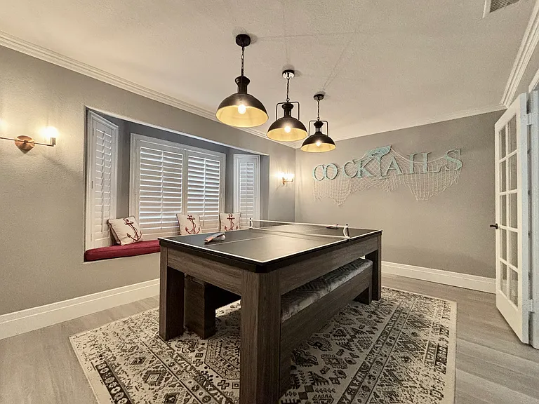 Billiard room with convertible pool table/ping-pong table