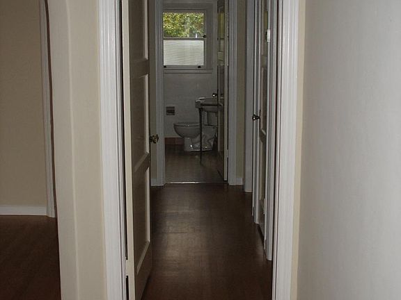 Hallway from living room looking towards bathroom